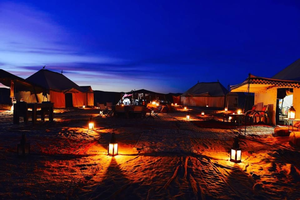 Merzouga camel trek sunset Erg Chebbi desert camp